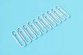 Group Paper clips on a blue background.