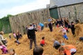 Group of parents and children playing in hay stacks,Bunratty Castle,Ireland,2014 Royalty Free Stock Photo