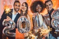 Group of party people celebrating the arrival of 2018 Royalty Free Stock Photo