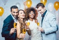 Group of party people celebrating with drinks Royalty Free Stock Photo