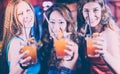 Group of party people - women with cocktails in a bar or club Royalty Free Stock Photo