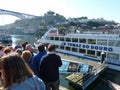 group of passengers boarding the TomÃ¡s do Douro cruise ship for a tour of the Douro River. Departure from the city of Porto. Royalty Free Stock Photo