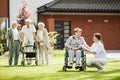 Patients next to a new modern nursing home Royalty Free Stock Photo