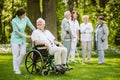 Group of patients and nurses in the nursing home Royalty Free Stock Photo