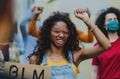 Group of people activists protesting on streets, BLM demonstration and coronavirus concept. Royalty Free Stock Photo