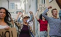 Group of people activists protesting on streets, strike and demonstration concept. Royalty Free Stock Photo