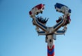 Group of people on a amusement park game spinning in the sky. Having fun on a fairground ride Royalty Free Stock Photo
