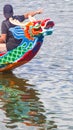 Group of people on beautiful boats during Asian traditional competition- the dragon race