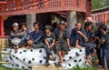 Group of people in black at funeral ceremony. Tana Toraja
