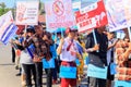 a group of people carrying banners