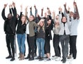 Casual group of excited friends with arms up isolated on white Royalty Free Stock Photo