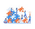 A group of people connecting puzzle pieces. Business teamwork in solving problems. Team Building concept. Royalty Free Stock Photo