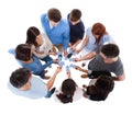 Group of people connecting puzzle pieces Royalty Free Stock Photo