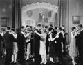 Group of people dancing in a ballroom