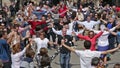 Group of people dancing circle dance long sardana