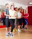 Group of people dancing salsa in studio Royalty Free Stock Photo