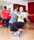 Group of people dancing salsa in studio Royalty Free Stock Photo