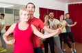 Group of people dancing salsa in studio Royalty Free Stock Photo