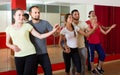 Group of people dancing salsa in studio Royalty Free Stock Photo