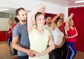 Group of people dancing salsa in studio Royalty Free Stock Photo