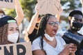 Group of people demonstrators protest in city street against racism - Equal rights fighting and black lives matter campaign