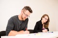 Group of people of different age sitting in classroom and attend