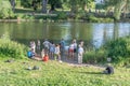 A group of people of different ages refreshing themselves in the Danube near Regensburg during the citizen festival 2019, Germany