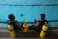 A group of people doing diving training in a swimming pool Royalty Free Stock Photo