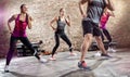 Group of people doing exercise with music