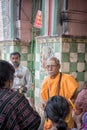 Tarakeswar, India Ã¢â¬â April 21 2019; Group of people doing puja to statue of Stones at Baba Taraknath Temple, Tarakeswar, West