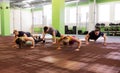 Group of people doing push-ups in gym Royalty Free Stock Photo