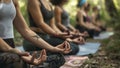 group of people doing yoga in the nature, yoga time in the naturre, people relaxing in the nature Royalty Free Stock Photo