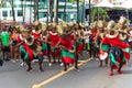 Group of people dressed in colorful costumes celebrate at a festival in Salvador, Brazil