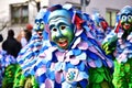 Group of people dressed in festive costumes celebrating the Fasching carnival parade in Germany