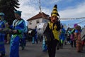 Group of people dressed in festive costumes celebrating the Fasching carnival parade in Germany