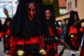Group of people dressed in festive costumes celebrating the Fasching carnival parade in Germany