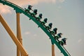 Group of people enjoy a Kraken roller coaster ride at Seaworld Ocean Marine Theme Park