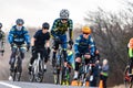 Group of people enjoying a ride on bicycles together along a scenic road, Cedar Hill Race Festival