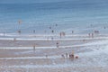 Group of people of enjoying a sunny day on the beach in Golfo Nuevo, Puerto Madryn, Chubut,Argentina Royalty Free Stock Photo