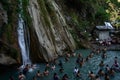 Group of people enjoying under the famous neer garh Waterfall, Rishikesh, Uttarakhand India