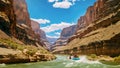 A group of people enjoys a thrilling ride as they navigate down the river on a raft, River rafting through the Grand Canyon