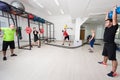 Group of Sportive People Training in a Gym Royalty Free Stock Photo