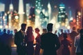 Group of people at fancy in rooftop party at night with the city lights as background Royalty Free Stock Photo