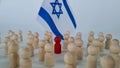 Group of people figurines and small flags of Israel