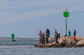 Group of people fishing during the annual Marthas Vineyard Stripped Bass and Bluefish derby