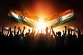 Group of people with the flag of India in the rays of the rising sun, Silhouette of a group of people waving Indian flags in Royalty Free Stock Photo