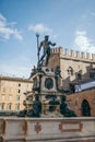 A group of people in front of Fountain of Neptune, Bologna Royalty Free Stock Photo