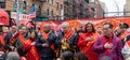 Group of people gathering together and holding hands over the heart during the parade Royalty Free Stock Photo