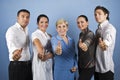 Group of people giving thumbs up Royalty Free Stock Photo