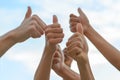 Group of people giving thumbs up Royalty Free Stock Photo